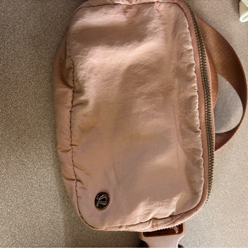Lululemon Pink belt bag with flaw
